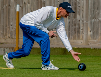 Maurice Awcock bowling in a Top Club match