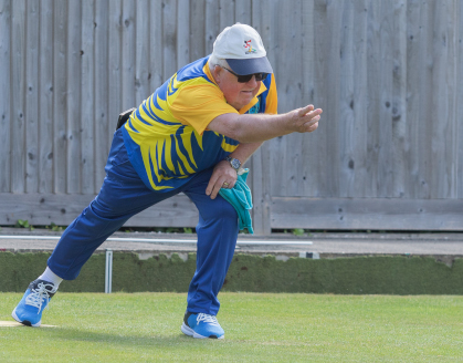 Maurice Awcock bowling in a Top Club match