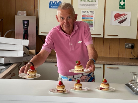 Ian with cakes